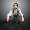 A Man Wearing Gray Hoodie And Gray Pants Squatting On Black Floor With Gray Background