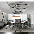 Modern Conference Room Interior Design With Long Table Black Chairs Circular Pendant Lights And Sofa Area