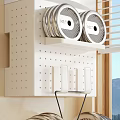 Organized Kitchen With White Pegboard Shelf Silver Circular Items Hooks And Natural Light 3d model