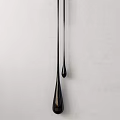 Sleek Black Pendant With Streamlined Drop Shaped Design For Modern Home Decor
