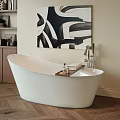 Freestanding White Bathtub with Sleek Design in Modern Bathroom Wooden Floor and Artwork