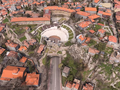 Urban Building Complex with Red Roofs and Central Circular Square in Aerial View 3d model