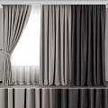 Gray Layered Fabric Curtains With Sheer Undertones And Pleated Window Design