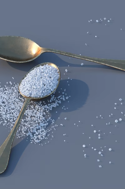 Golden Tableware Set With Spoons Holding White Granules And Scattered On Grey Background 3d model