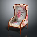 Elegant Wingback Armchair with Floral Pattern Upholstery and Brown Wooden Frame Design