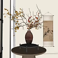 Ceramic Vase With Autumn Colored Branches On Wooden Stand In Room With Scroll Painting