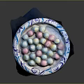 Colorful Marshmallows Arranged in Blue and White Patterned Plate on Dark Surface