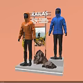 KAILAS Outdoor Clothing Display With Mannequins In Orange And Blue Hooded Jackets And Rock Decorations