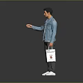 Casual Man In Blue Denim Jacket Holding Shopping Bag With Pointing Hand