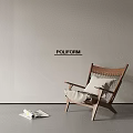 Poliform Leisure Chair with Wooden Frame Woven Backrest and Magazine in Minimalist Interior