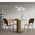 Wooden Round Dining Table Set with Wicker Chairs Cloud Pendant Light and Book Stack Sculpture 3d model