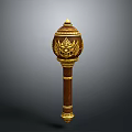 Intricate Brown Sculpture Carving With Golden Top Ornament And Detailed Patterns