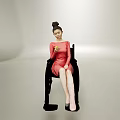 A Woman In Red Dress Sitting In Wheelchair With Bun Hairstyle Holding Apple