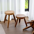 Wooden Side Tables With Two Standing And One Lying On Wooden Floor Near White Curtains