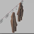 Two Brown Coats Drying On Clothesline Against Light Blue Sky 3d model