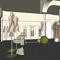 Modern Fashion Clothing Store Interior With Mannequins Hanging Clothes And Green Plants