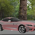 Red BMW Two Door Sports Car With Sleek Body And Silver Alloy Wheels