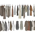 Variety of Clothes Hanging on Racks with Different Styles and Neutral Colors