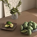 Fresh Ripe Avocados Halved and Whole on Wooden Table with Green Plant Vase