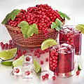 Refreshing Iced Red Berry Drink with Fresh Red Currants Lime Slices and Ice Cubes