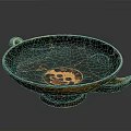 Sculpted Carvings On Ancient Pottery Plate With Decorative Handles And Intricate Design