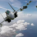 Two fighter jets flying in blue sky with white clouds and coastal ocean view below