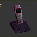 Vintage Mobile Phone On Charging Dock With Illuminated Screen And Classic Numeric Keypad