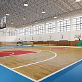 Spacious Basketball Gymnasium With Multiple Courts Wooden Flooring Blue Red Areas Windows And Ceiling Lights