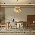 Modern Restaurant Interior With Pendant Light Wooden Dining Table Chairs Area Rug And Green Plant