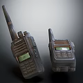 Vintage Walkie Talkies With Antennas Display Screens And Control Buttons On Dark Surface