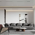 Modern Living and Dining Room Interior With Gray Sofa Round Coffee Tables And Abstract Artwork