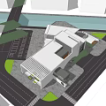 Modern Cultural Center Building With Geometric Design In Urban Area And Green Space