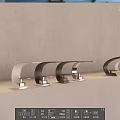 Multiple Modern Faucets In Various Colors And Designs On Light Countertop With Gray Wall