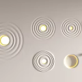 Modern Circular Wall Lamps with Concentric Patterns and Illuminated Effect on White Background 3d model