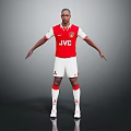 Football Player In Red And White Jersey With JVC Logo Standing In Athletic Pose