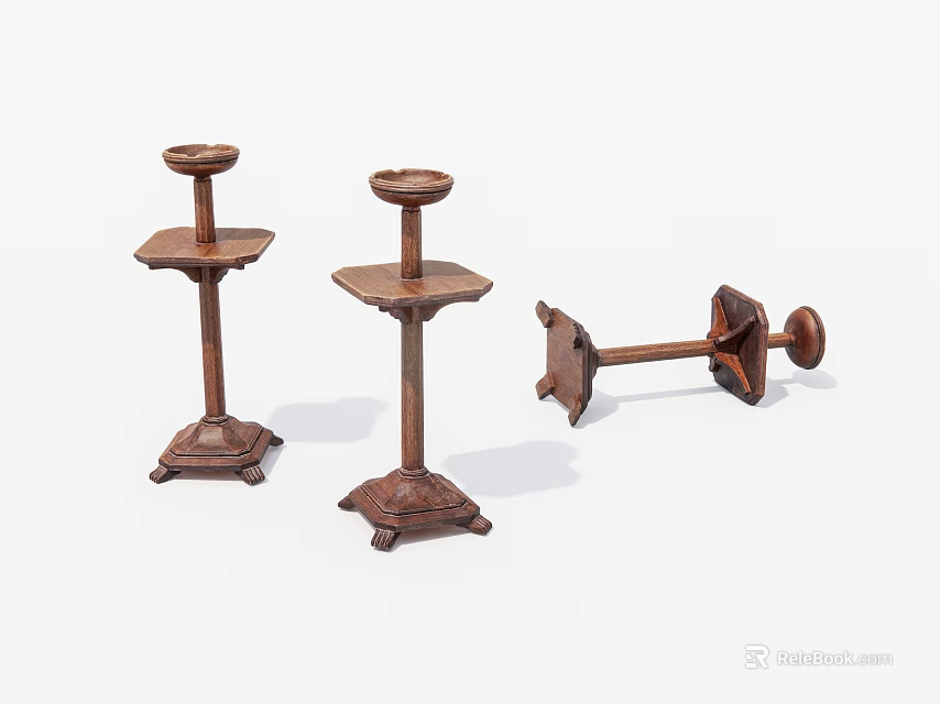 Three Antique Iron Candlesticks With Ornate Bases And Rustic Design 3d model