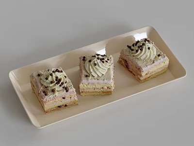 Delicious Layered Cream Cakes Topped With Chocolate Shavings On White Rectangular Tray 3d model
