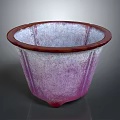 Plant Pot With Purple Textured Surface Brown Rim And Footed Base For Indoor Plants