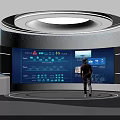 Person Standing In Tech Control Room With Large Blue Data Screen Icons And Circular Lights 3d model