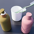 Essential Daily Washing Products Including Yellow Pink Bottles White Cup and Green Toothbrush