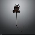 Vintage Brown Gas Mask Protective Gear Hanging on Metal Hook Gray Background