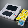 Nintendo 3DS Console With Pikachu Patterned Case And Pokémon Game Cartridge