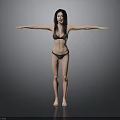 Woman In Black Bikini Standing With Arms Outstretched On Grey Background