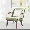 Single Sofa with Green Upholstery Wooden Armrests Legs and Decorative Pillow in Modern Living Room