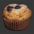 Homemade Style Golden Fluffy Blueberry Muffin With Fresh Blueberries And Paper Liner