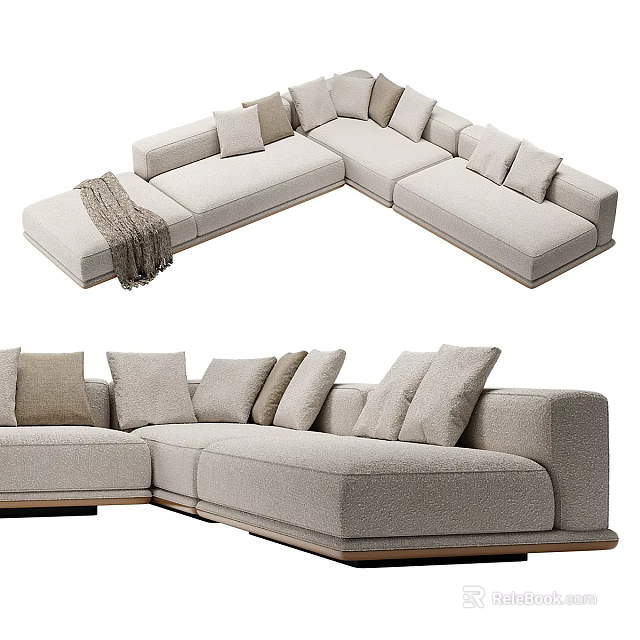 L Shaped Beige Sectional Sofa With Plush Pillows And Throw Blanket 3d model