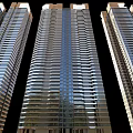 Modern High Rise Residential Towers With Glass Facade And Sleek Exterior Design