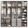 Organized Closet Space with Dresser Hanging Clothes Folded Garments Shoes and Bags