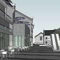 Modern Commercial Street With Traditional Buildings Trees Storefronts And Street Lamps
