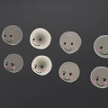 Multiple Round Transparent Objects With Smiling Faces Arranged Against Gray Background